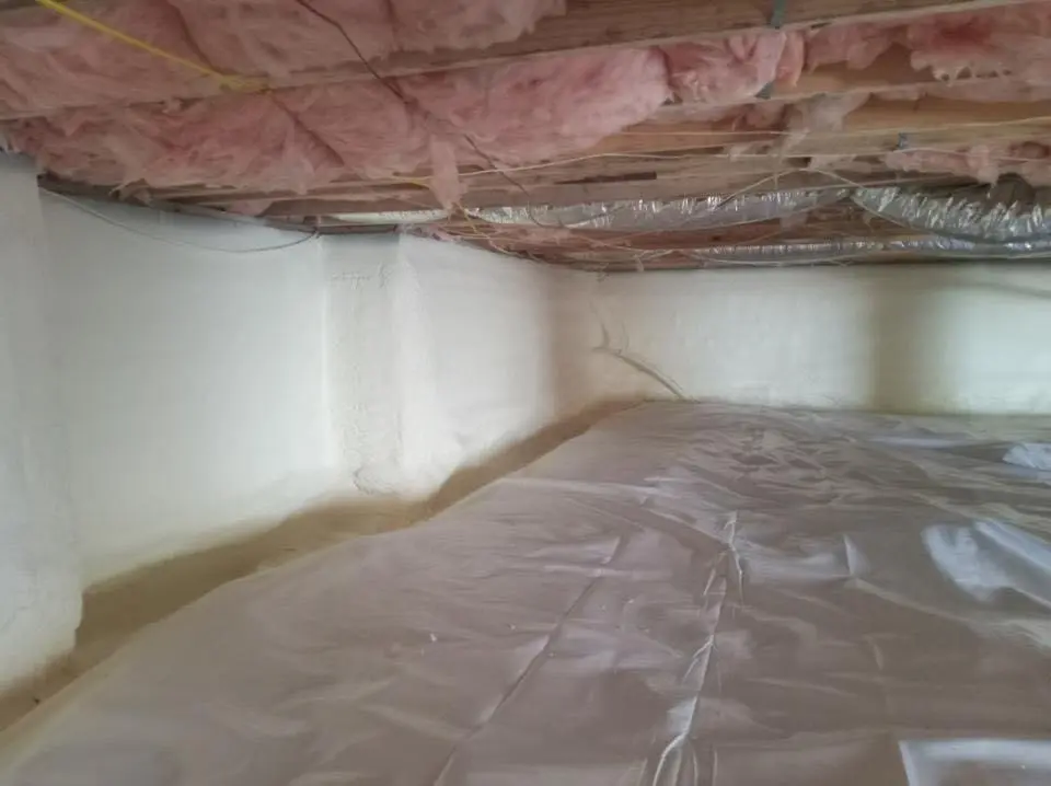 Crawl space encapsulation with closed-cell spray foam for Commercial Roof Restoration in Quincy